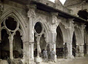 Two French Soldiers and Horses in the Cloister of the Abbey of Saint-Jean-des-Vignes, Heavily Damaged by Artillery Fire, Soissons, Aisne, France, 1917